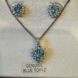 Blue Topaz with white Topaz accents Pendant necklace with matching earrings.